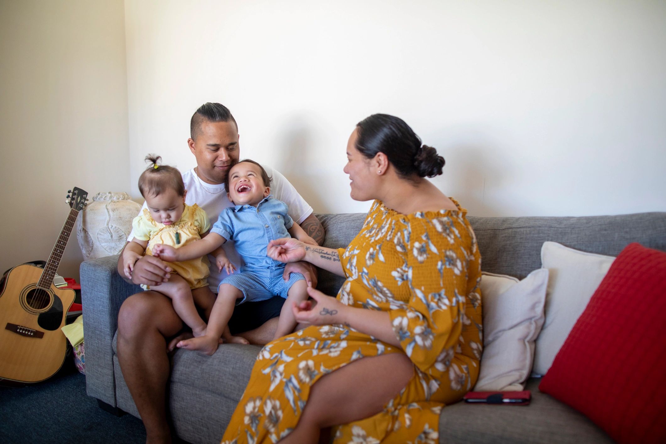 Young family together at home