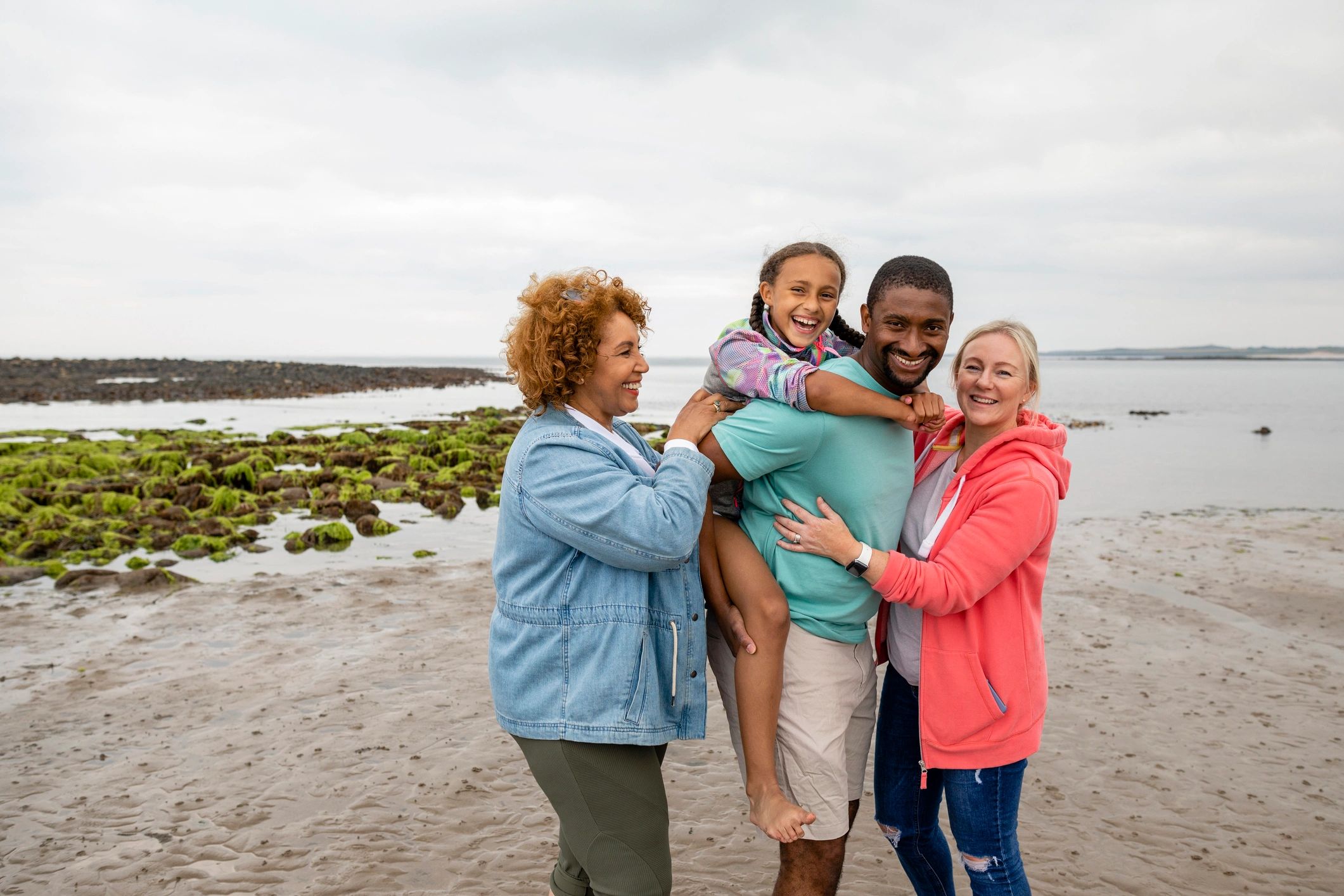 Family standing together outdoors