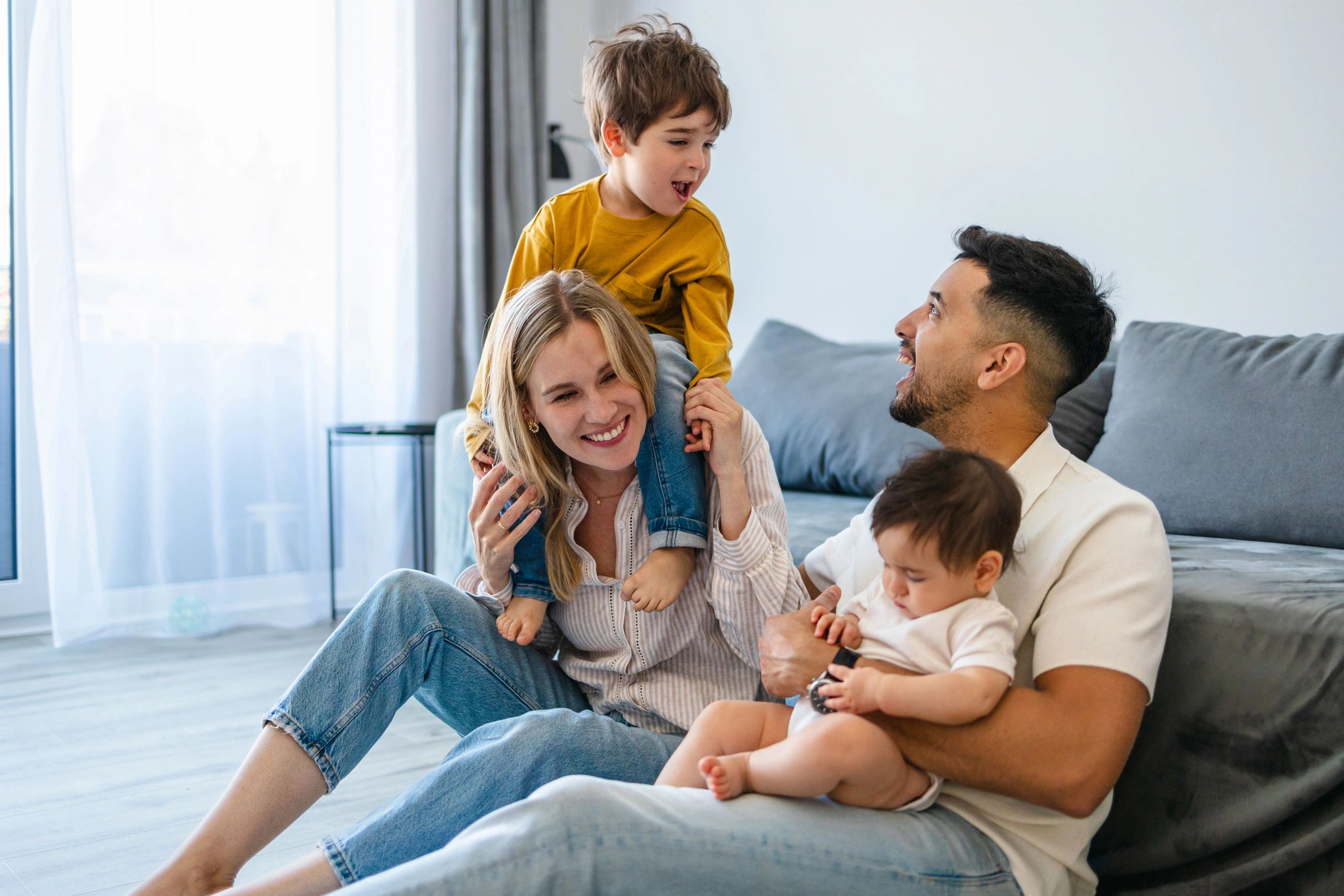 Young family playing together at home